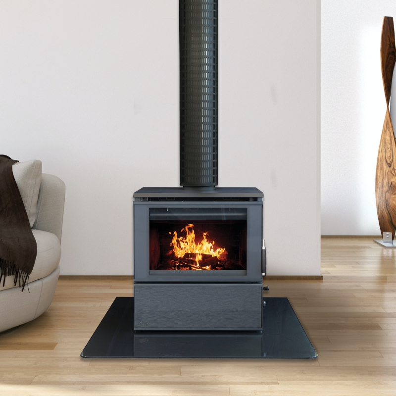 Modern Black Wood Stove With Visible Fire on a Black Hearth in a Bright Room — Complete Heating In Huntingfield, TAS
