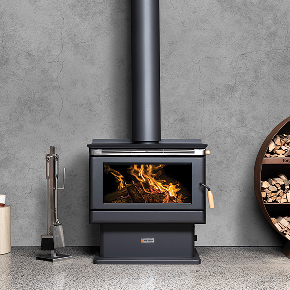 Modern Black Wood Stove With Visible Fire and Chimney Pipe — Complete Heating In Huntingfield, TAS