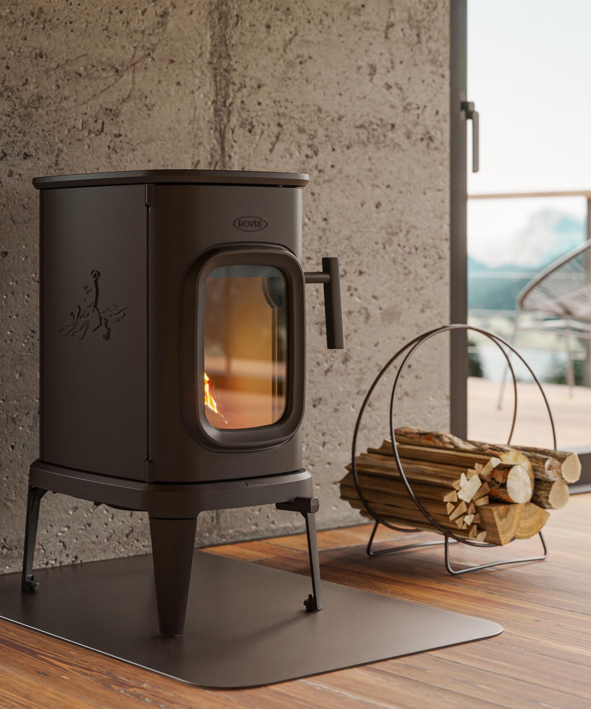 Black Wood Stove Glowing in a Modern Room Beside a Basket of Firewood — Complete Heating In Huntingfield, TAS