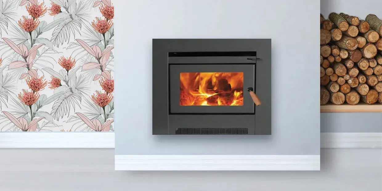 Modern Black Fireplace With a Burning Fire, Set in a Light Grey Wall — Complete Heating In Huntingfield, TAS