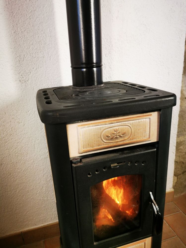 A Black, Free-standing Wood Stove — Complete Heating In Huntingfield, TAS