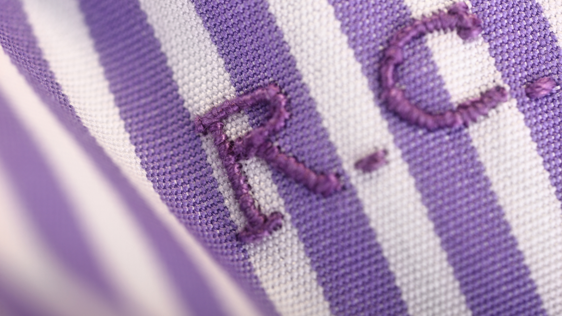 Purple embroidered initials