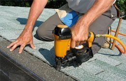 Man repairing roof | Spanish Fort, AL | Gafford Roofing Repair