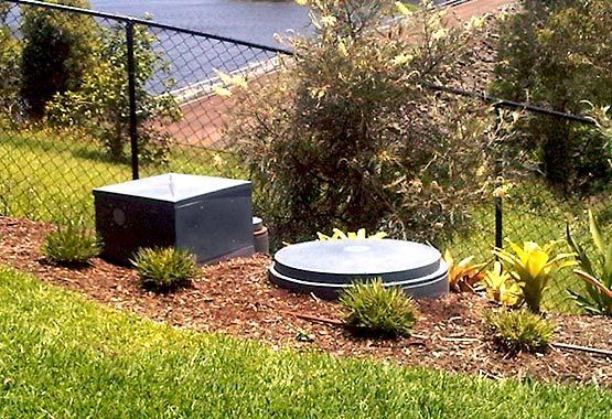 A Close Up of a Septic Tank Filled With Dirty Water — Loogistics in Mooloolaba, QLD