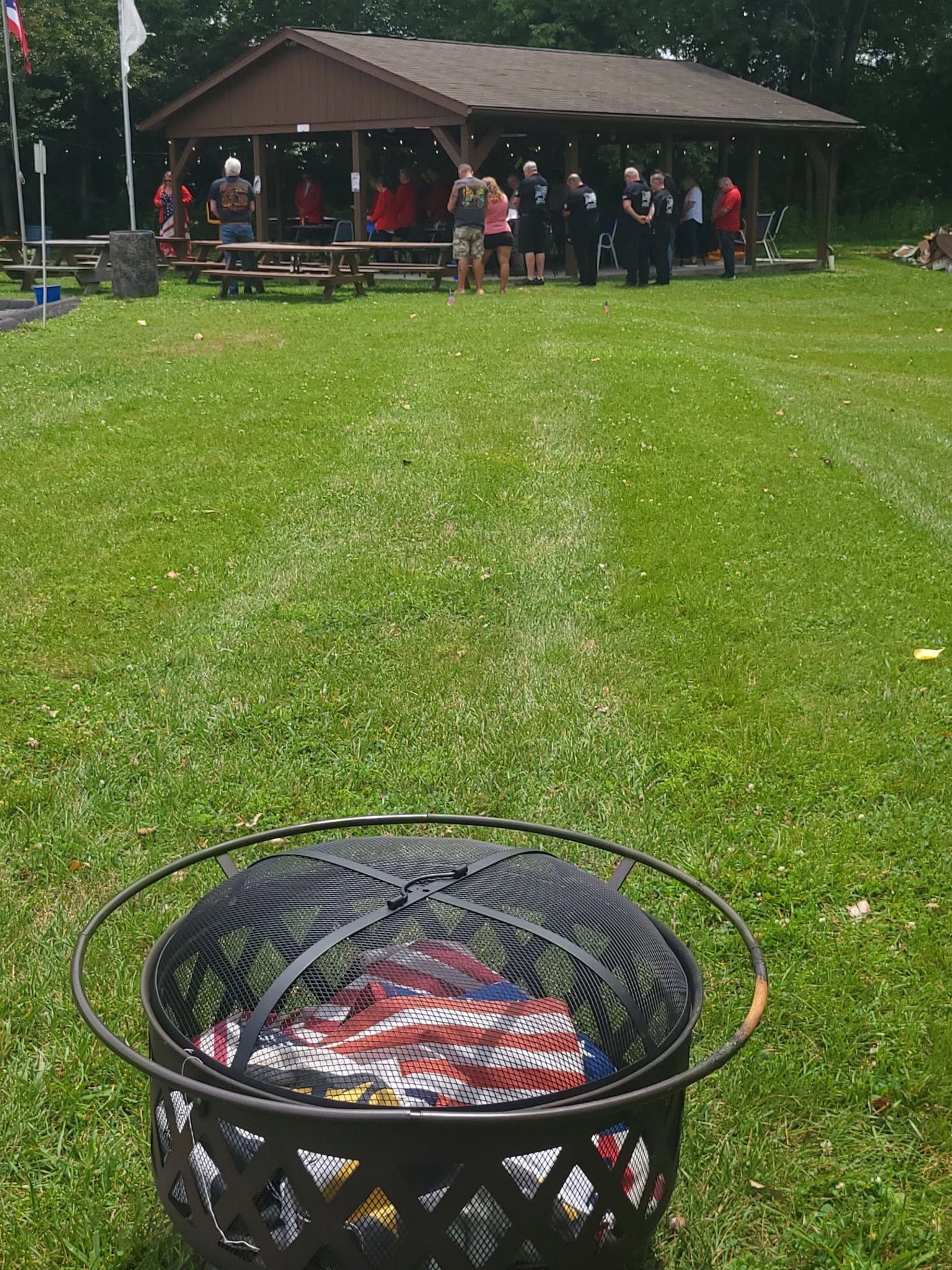 Honor guard members at a flag retirement ceremony