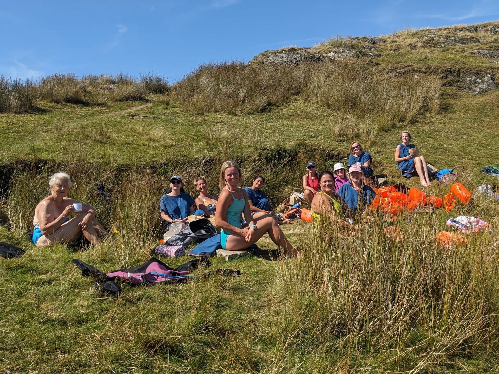 people sitting on grass