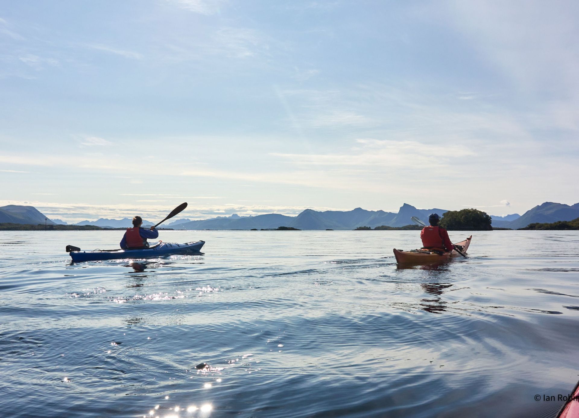 A group of people kayaking in Norway