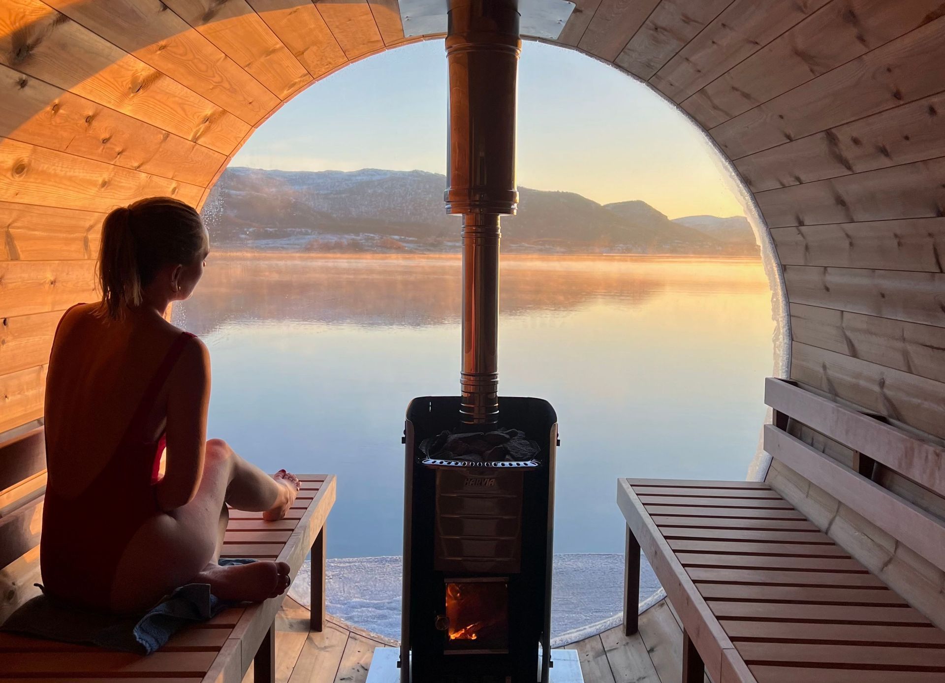 Woman sitting in sauna