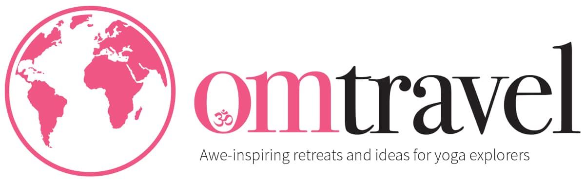 Om travel logo with a pink globe and text 