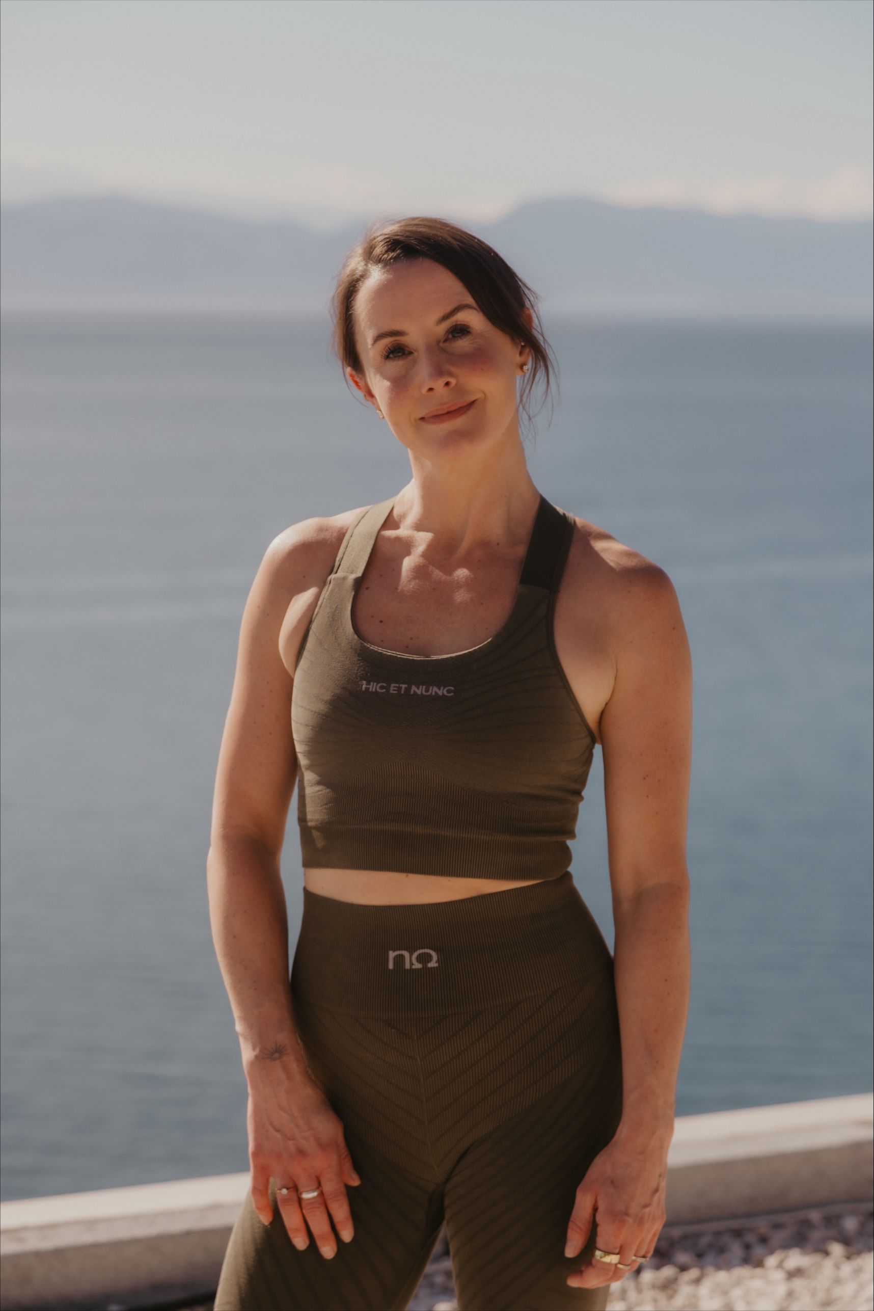 Woman with brown hair smiling