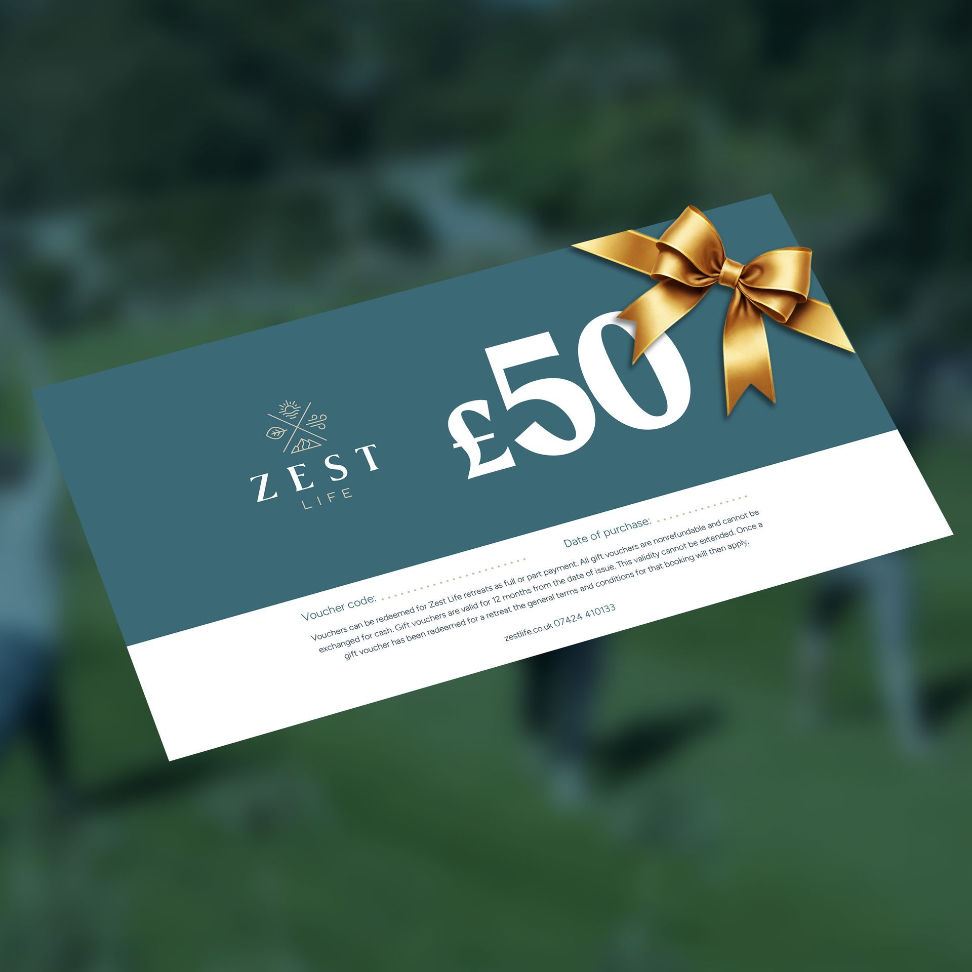 Gift card for £50 with a gold bow. Teal card with 