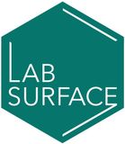 Teal hexagon logo with white “LAB SURFACE” text and diagonal white lines
