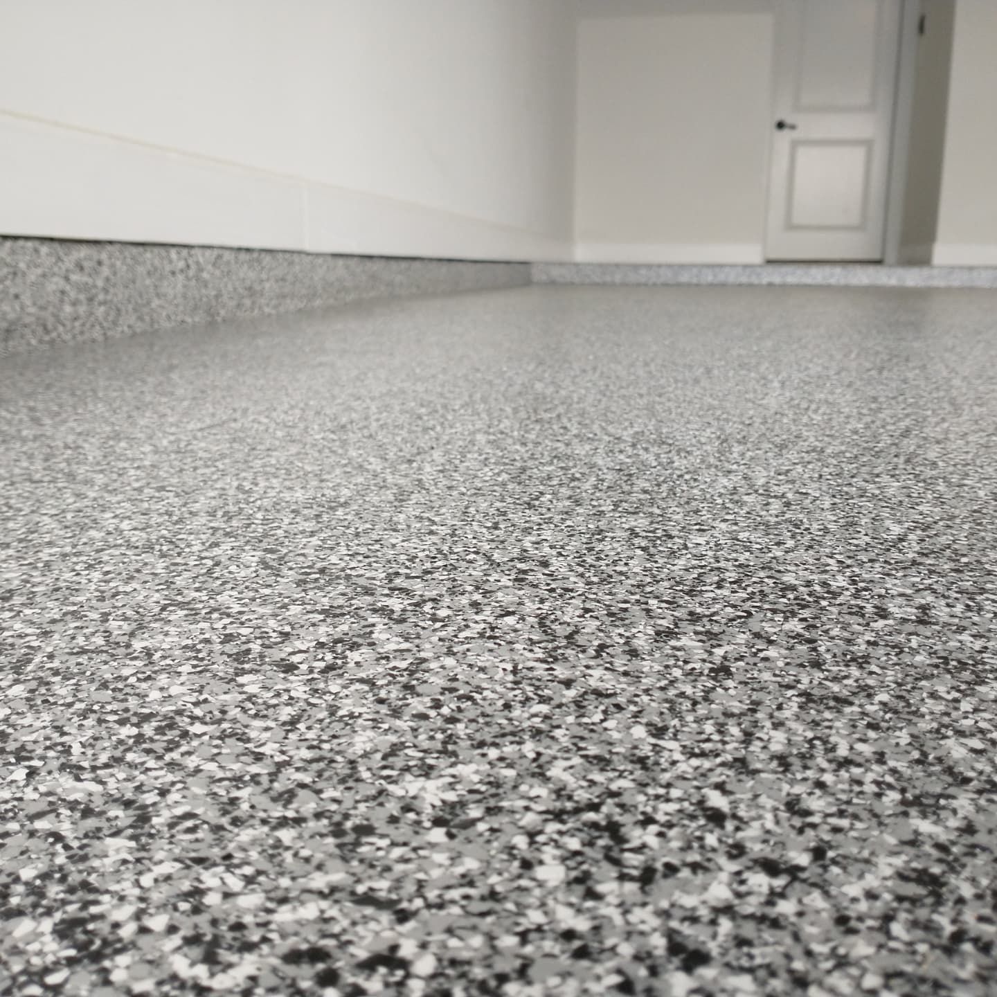 Domino Flake Blend Polyaspartic Garage Floor Picture
