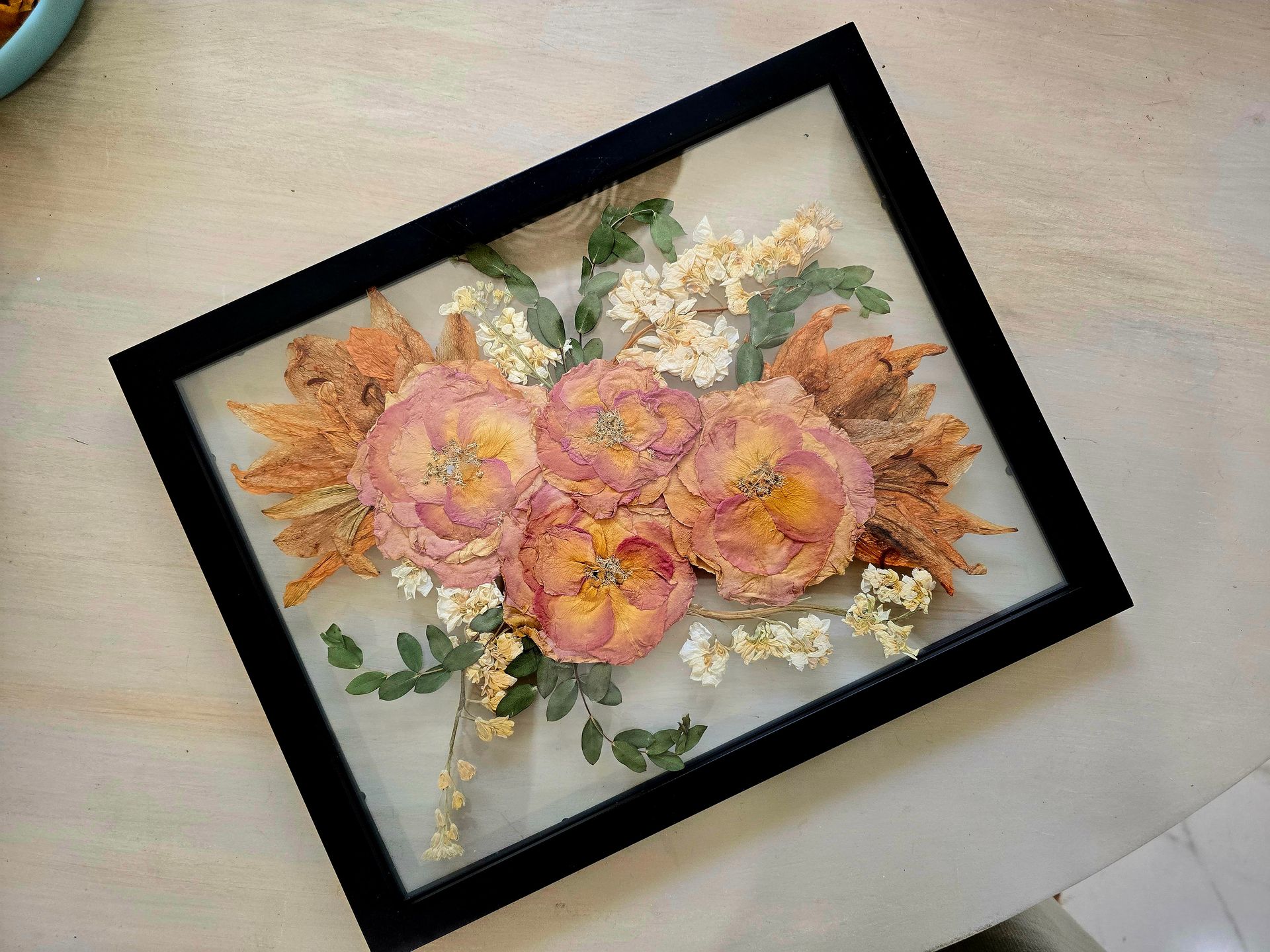 wedding flowers preserved in frame