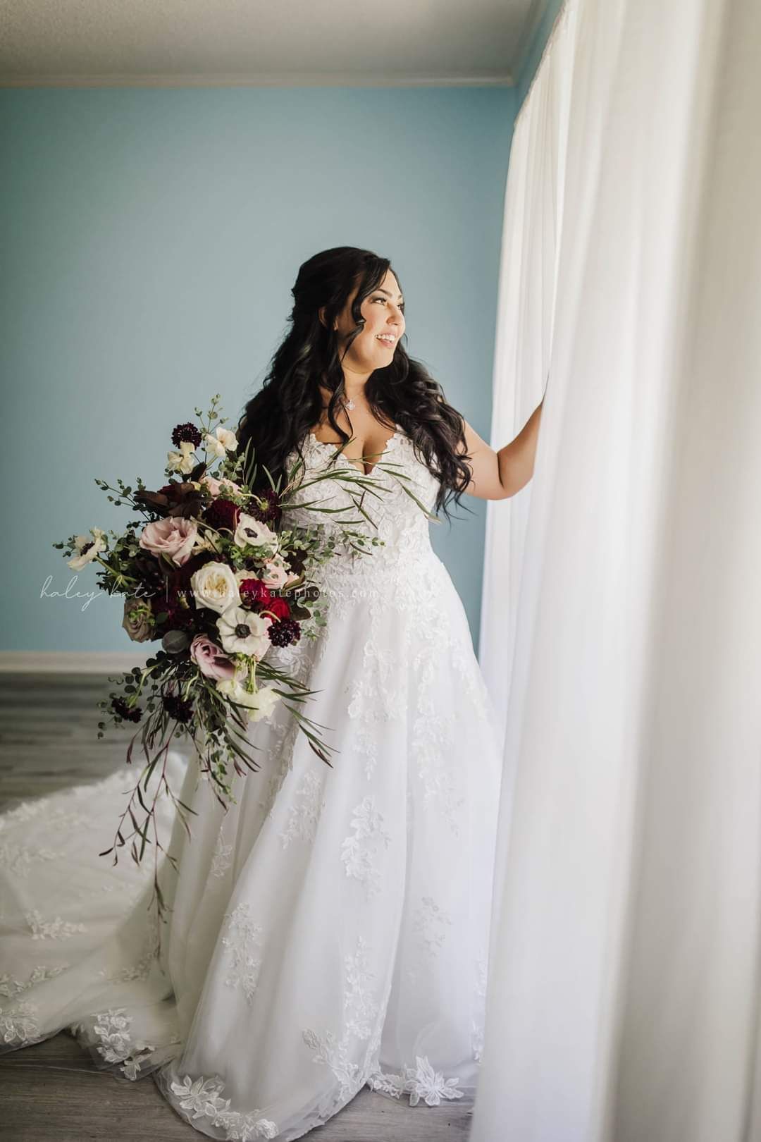 bride gazing out window