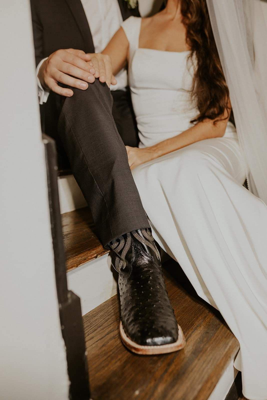 bride and groom holding hands