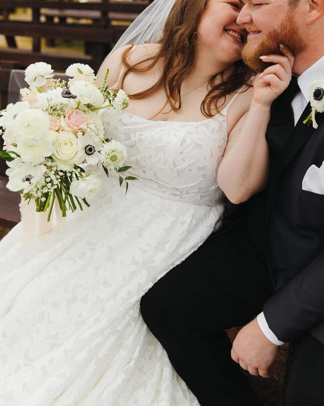 bride and groom kissing