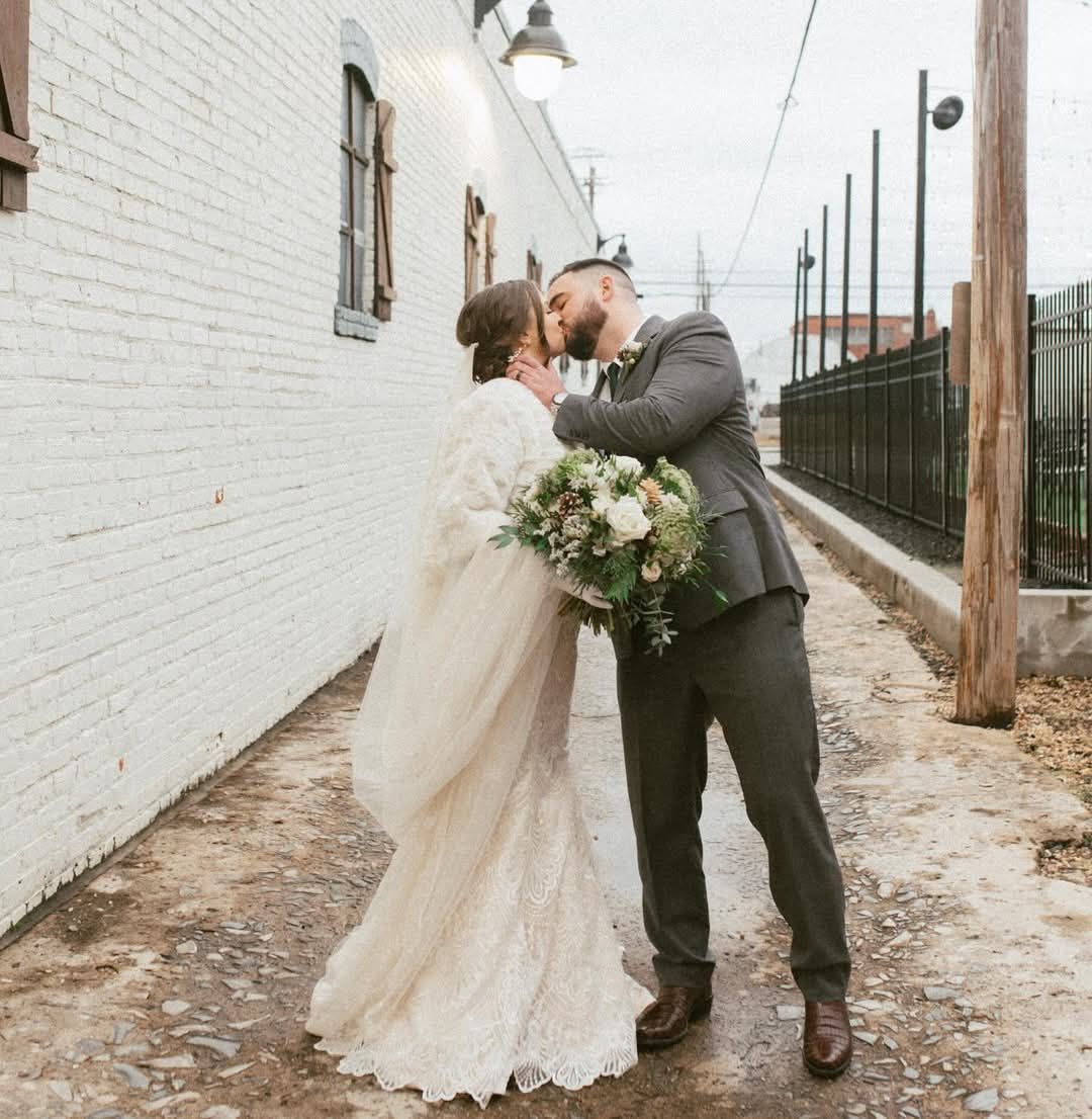 bride and groom kissing