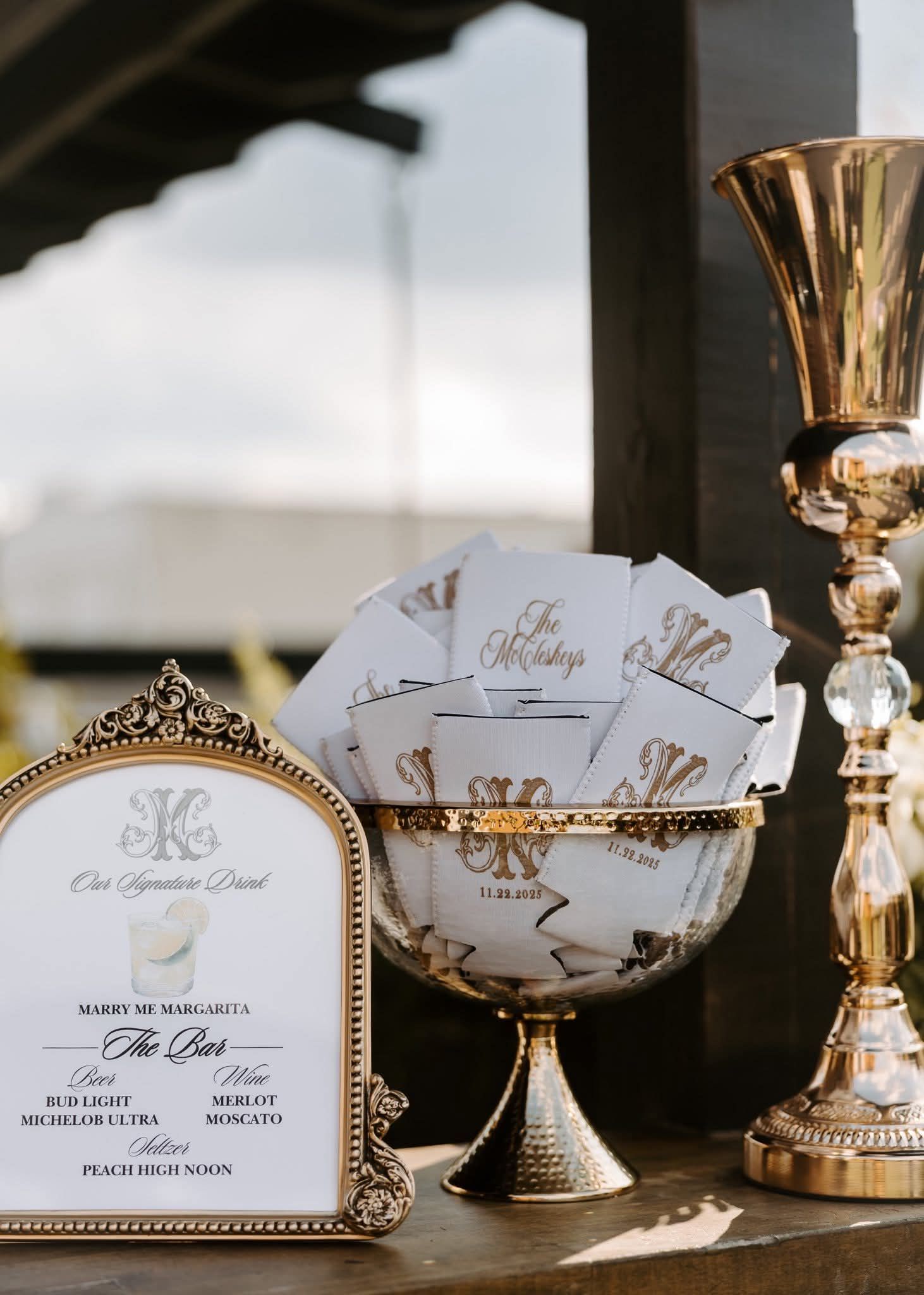 gold container with koozie wedding favors