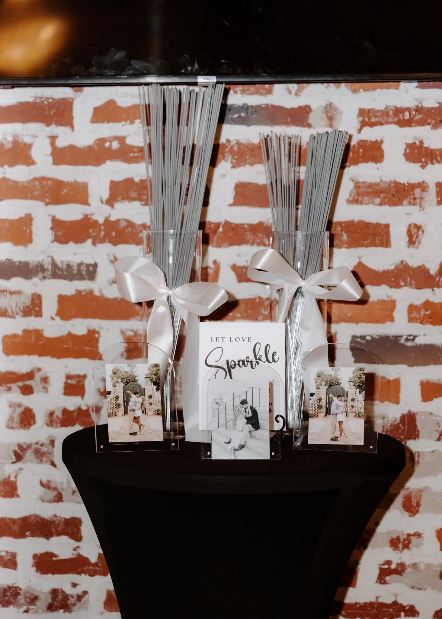 wedding table with photos of bride and groom together