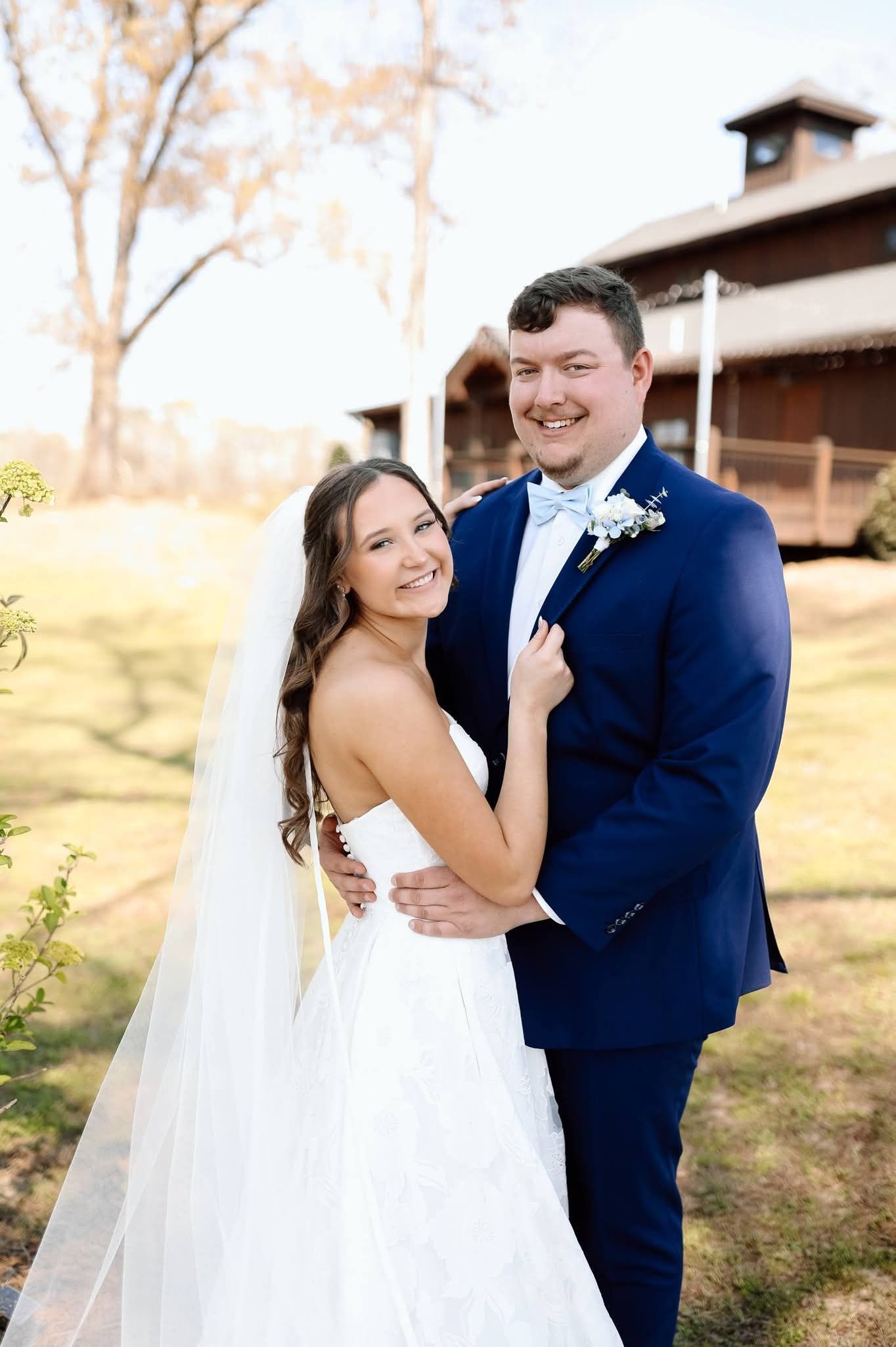 bride and groom smiling