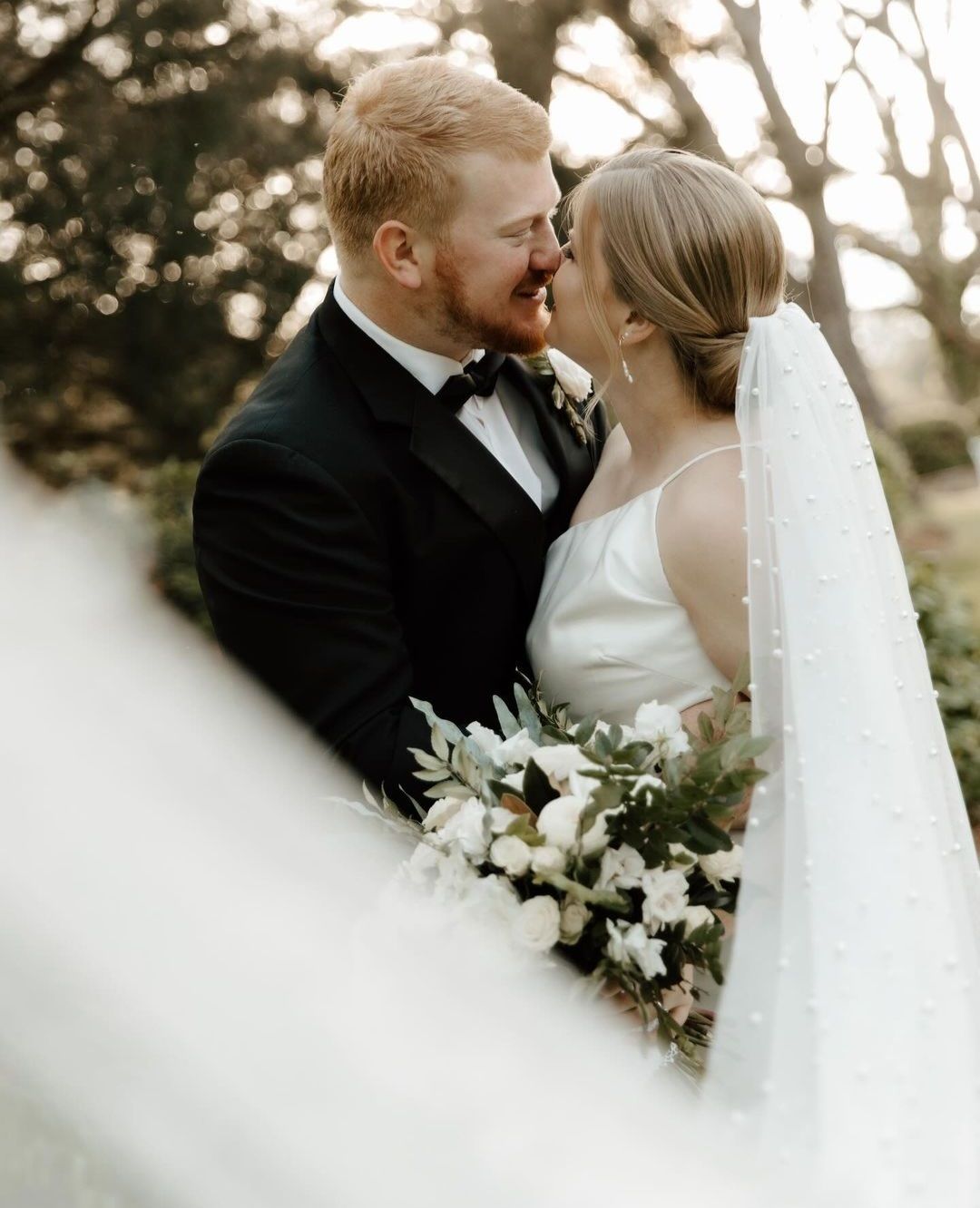 bride and groom kissing