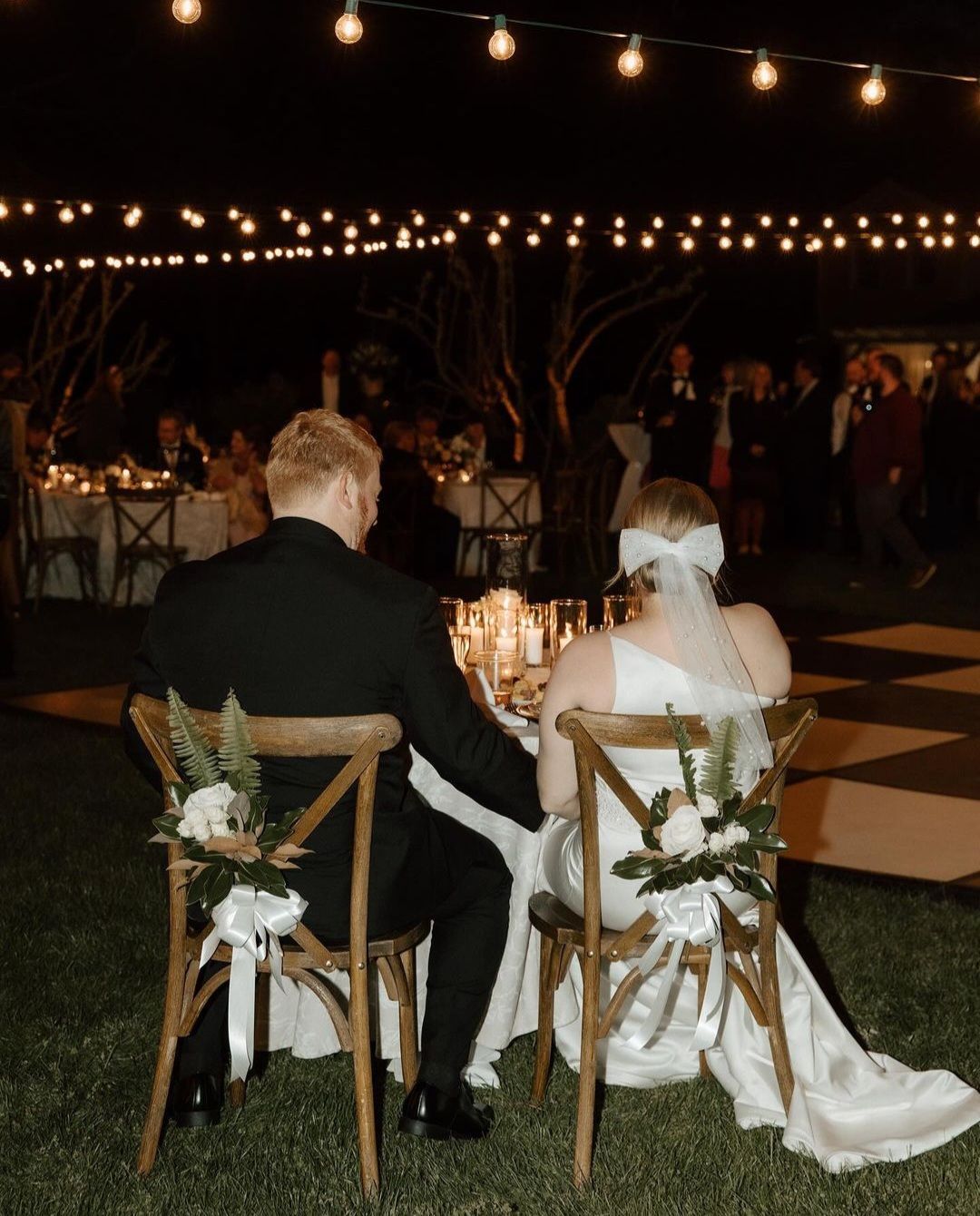 bride and groom dining at wedding reception table