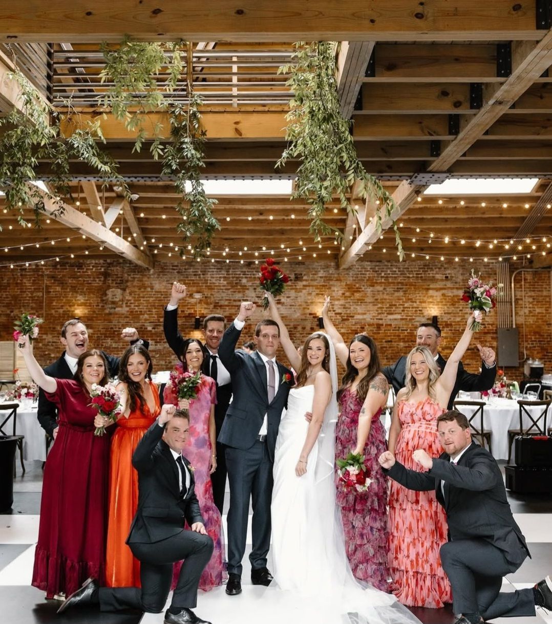 bride and groom surrounded by family
