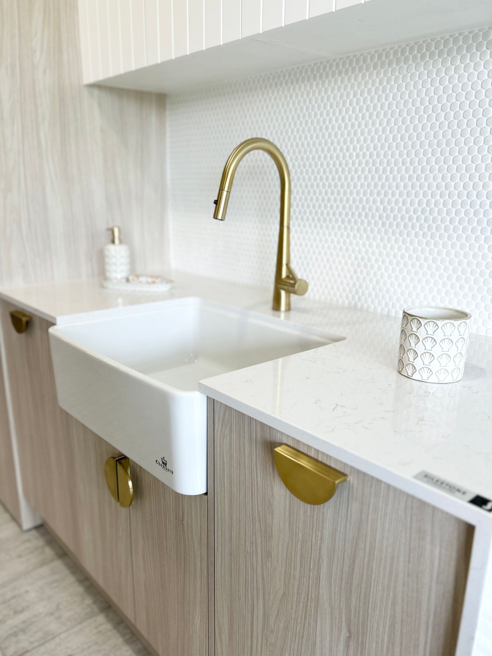 A Laundry Room With a Washer and Dryer and a Sink — Kenross Kitchens In Erina, NSW