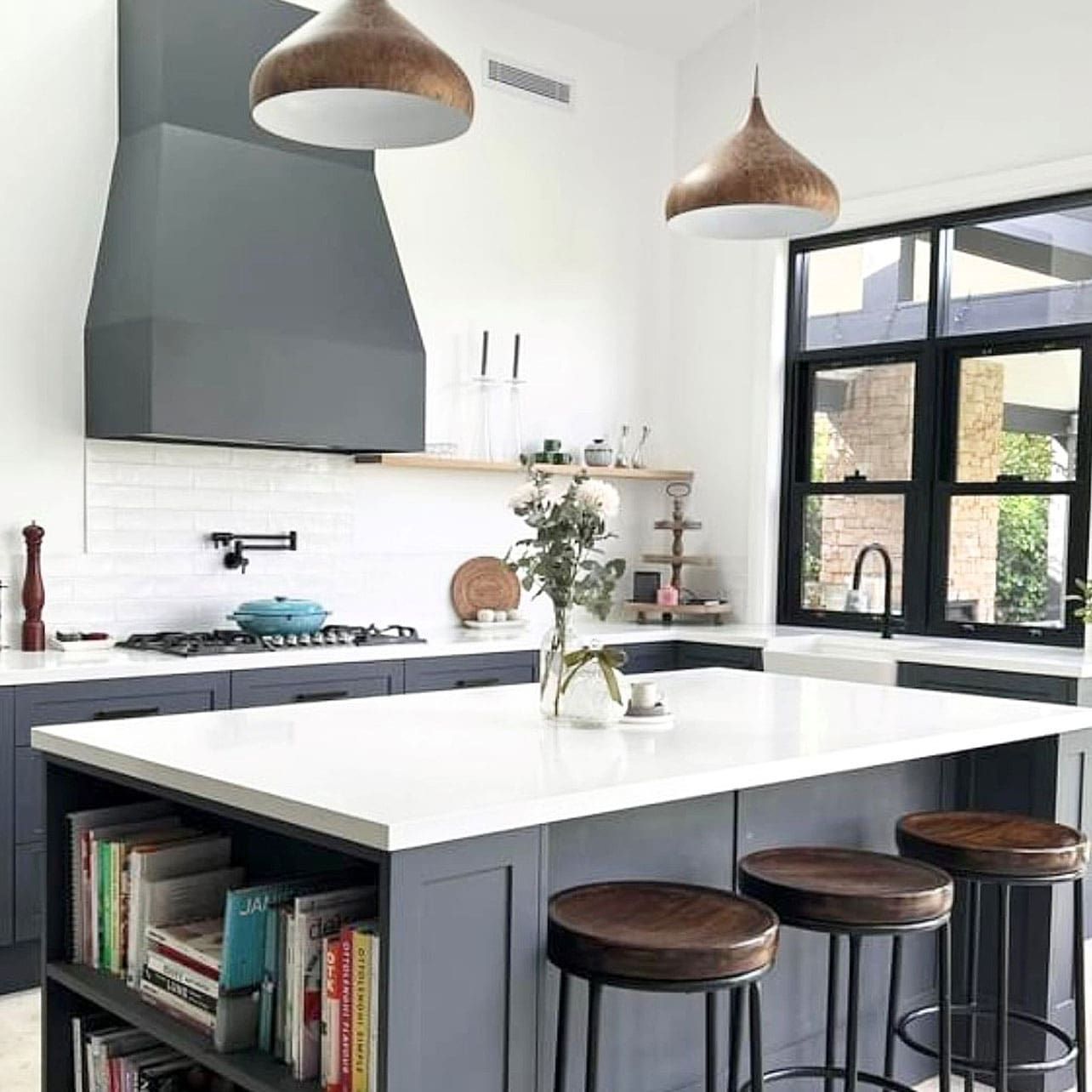 A Kitchen With a Large Island and Stools — Kenross Kitchens In Woy Woy, NSW