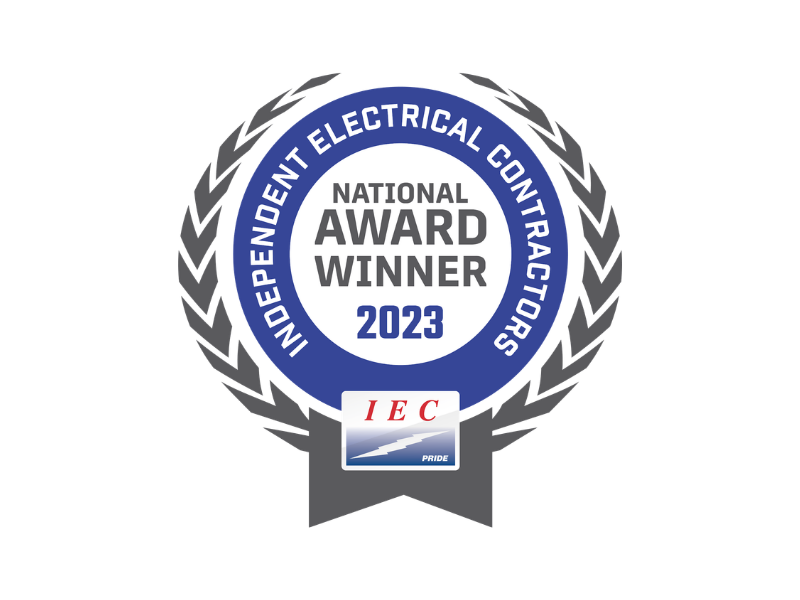 Logo reading “National Award Winner 2023” for Independent Electrical Contractors, with gray laurel wreath and blue center