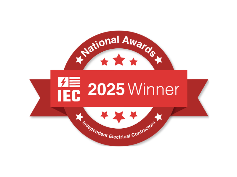 Red IEC 2025 Winner National Awards badge in red and white