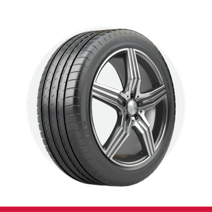 A close up of a tire on a wheel on a white background.