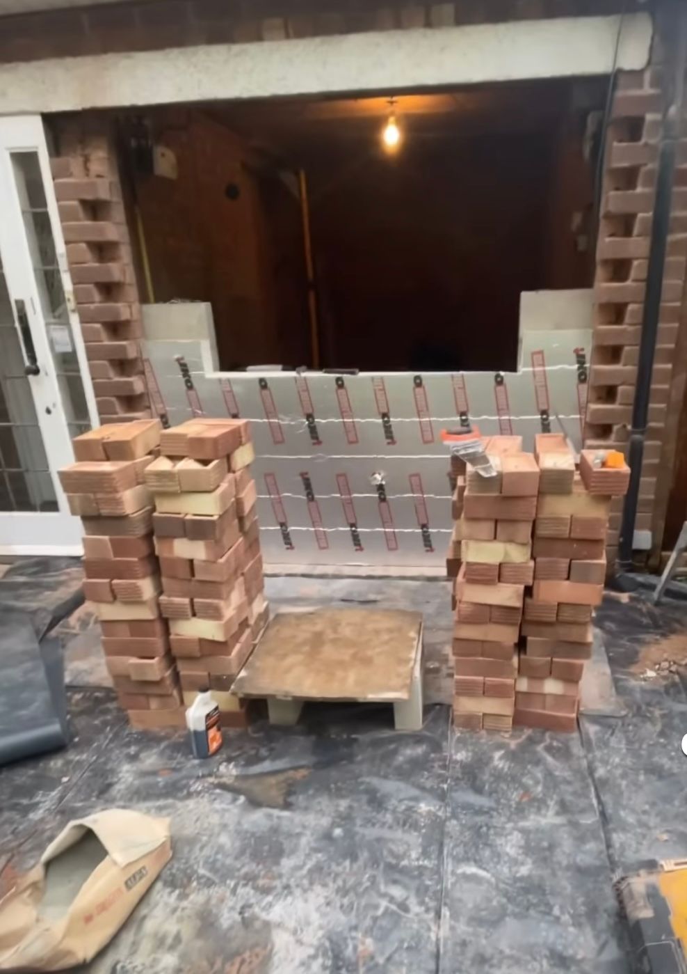 a house with stairs leading to the front door
