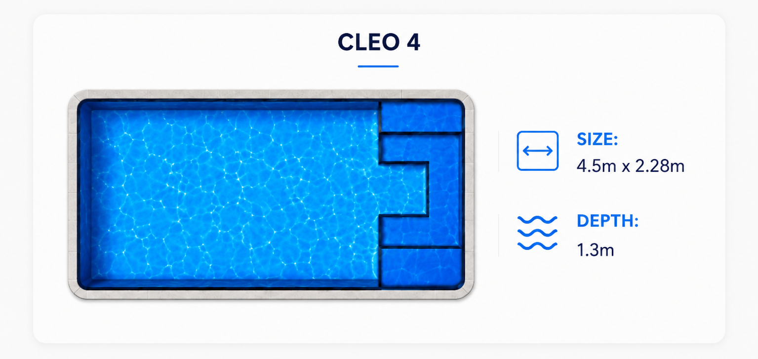 Blue rectangular swimming pool with tiled water and a light stone deck beside it.