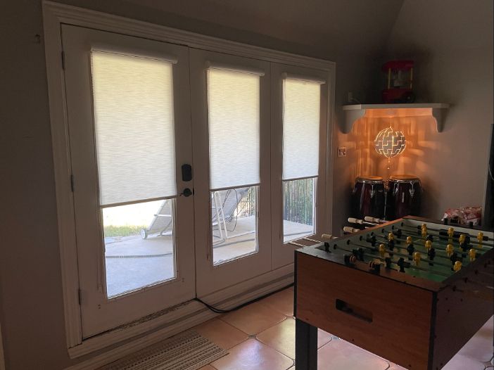 Love is Blinds, TX - Roller Shades in the game room.
