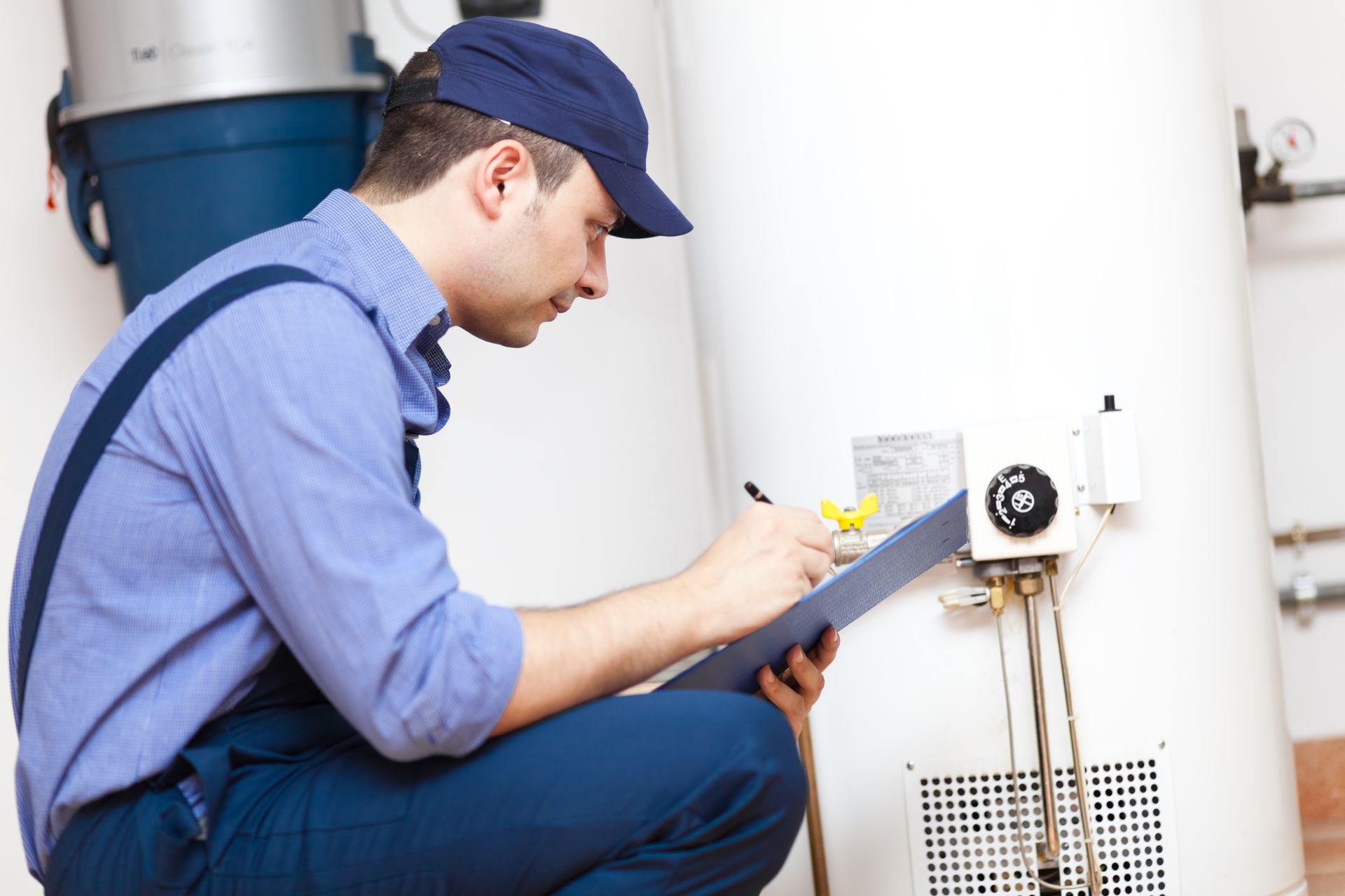 plumber repairing a water heater