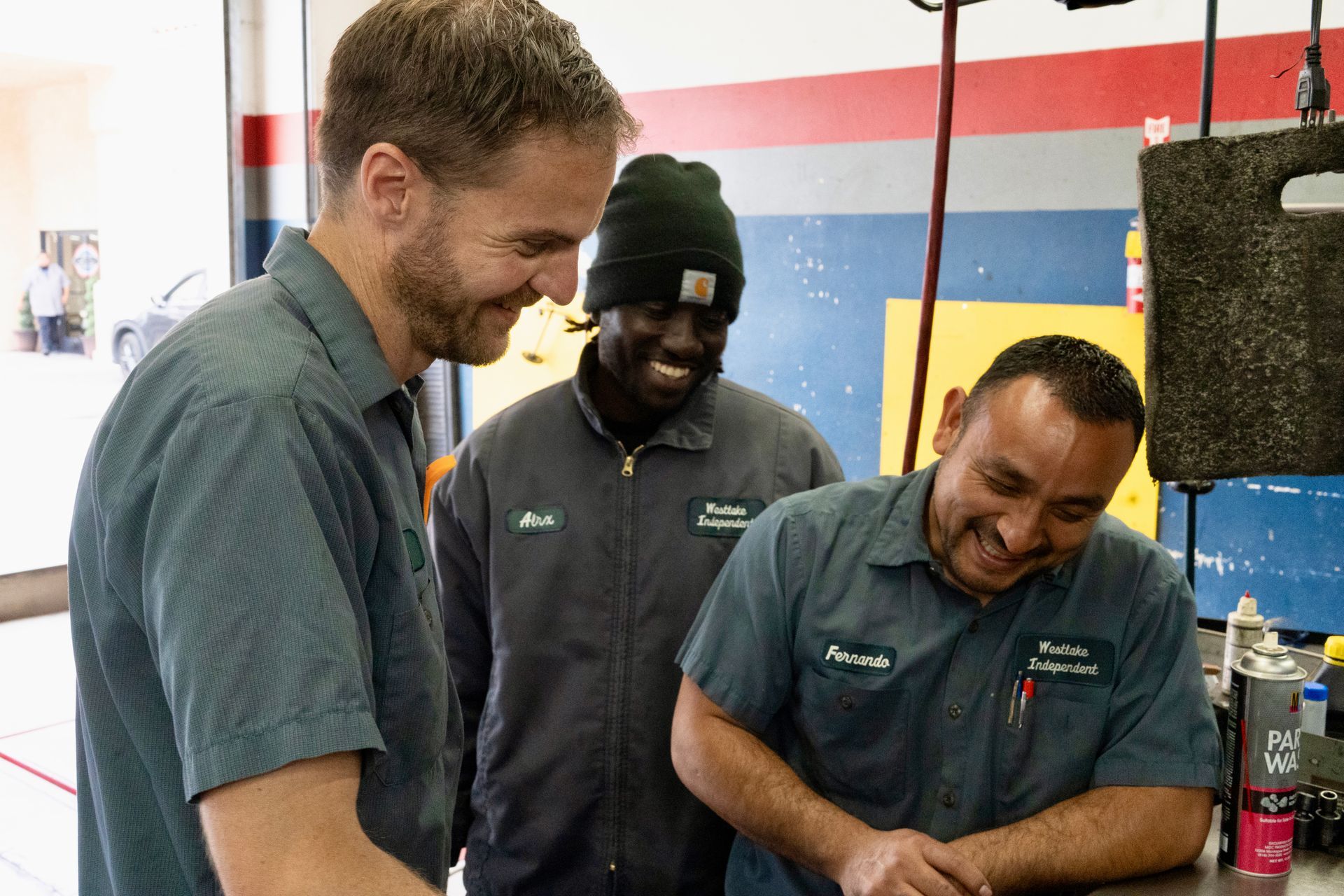 Three people smiling | Westlake Independent Automotive