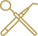 Gold crossed dental tools: mirror and explorer.