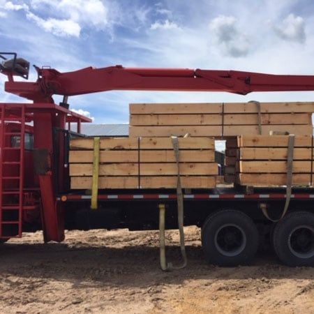 Lumber being delivered Lumber being delivered