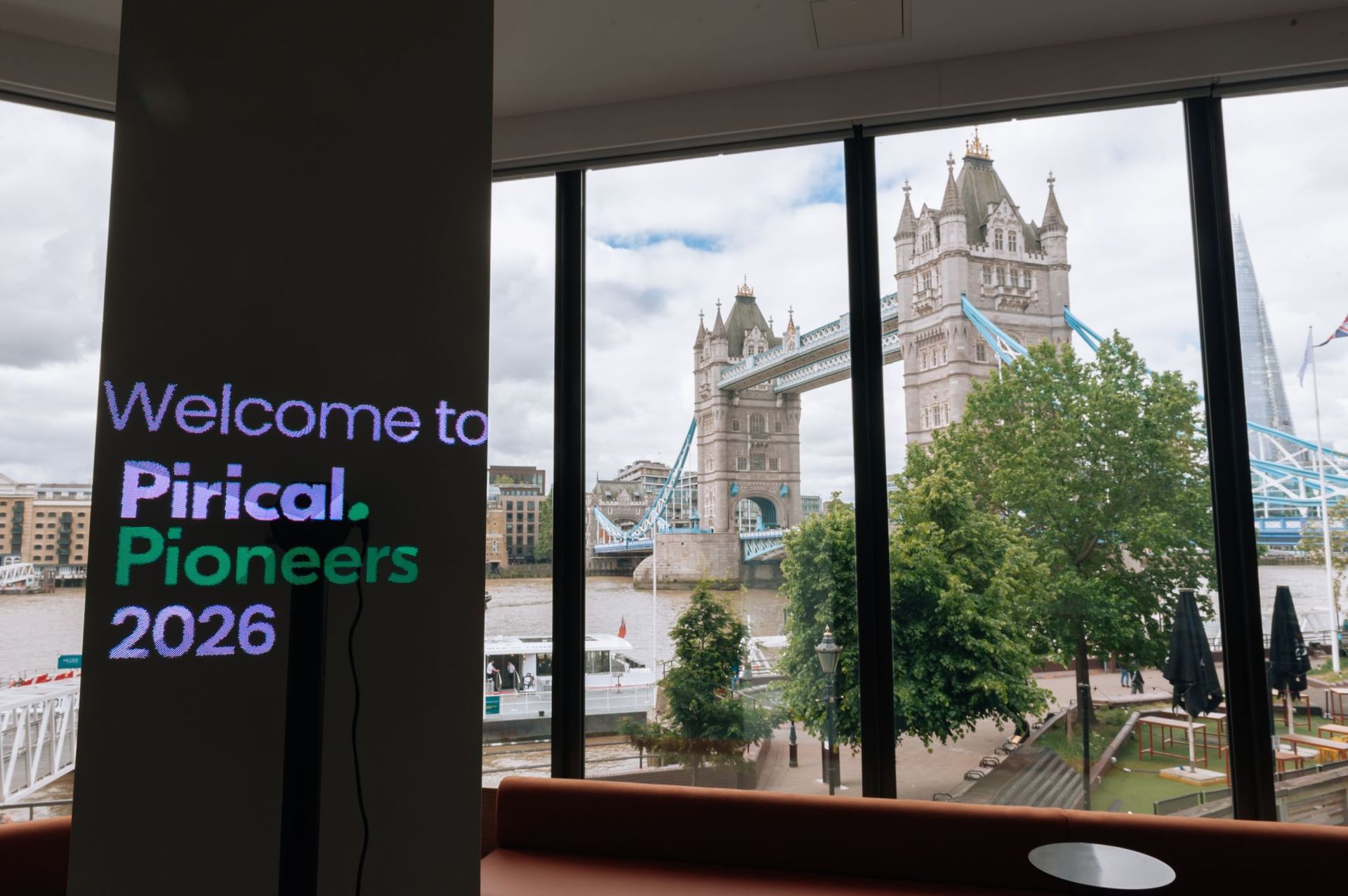 Pirical Pioneers logo next to Tower Bridge
