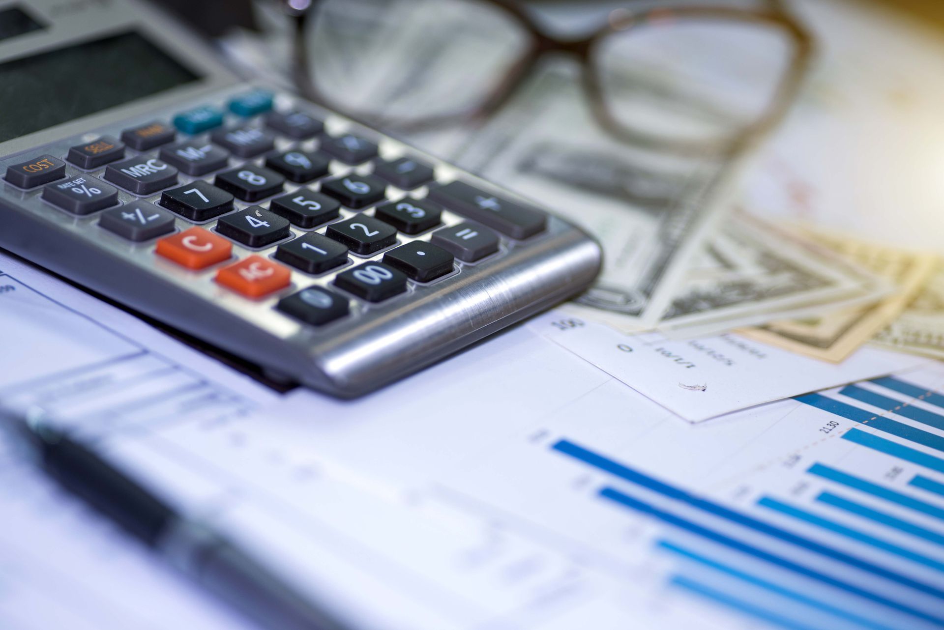 Calculator, Pen and Summary Report — Fayetteville, NC — Angels' Taxes