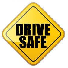 Yellow diamond road sign with bold black text reading “DRIVE SAFE”