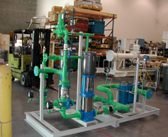 A forklift in a warehouse with a bunch of pipes