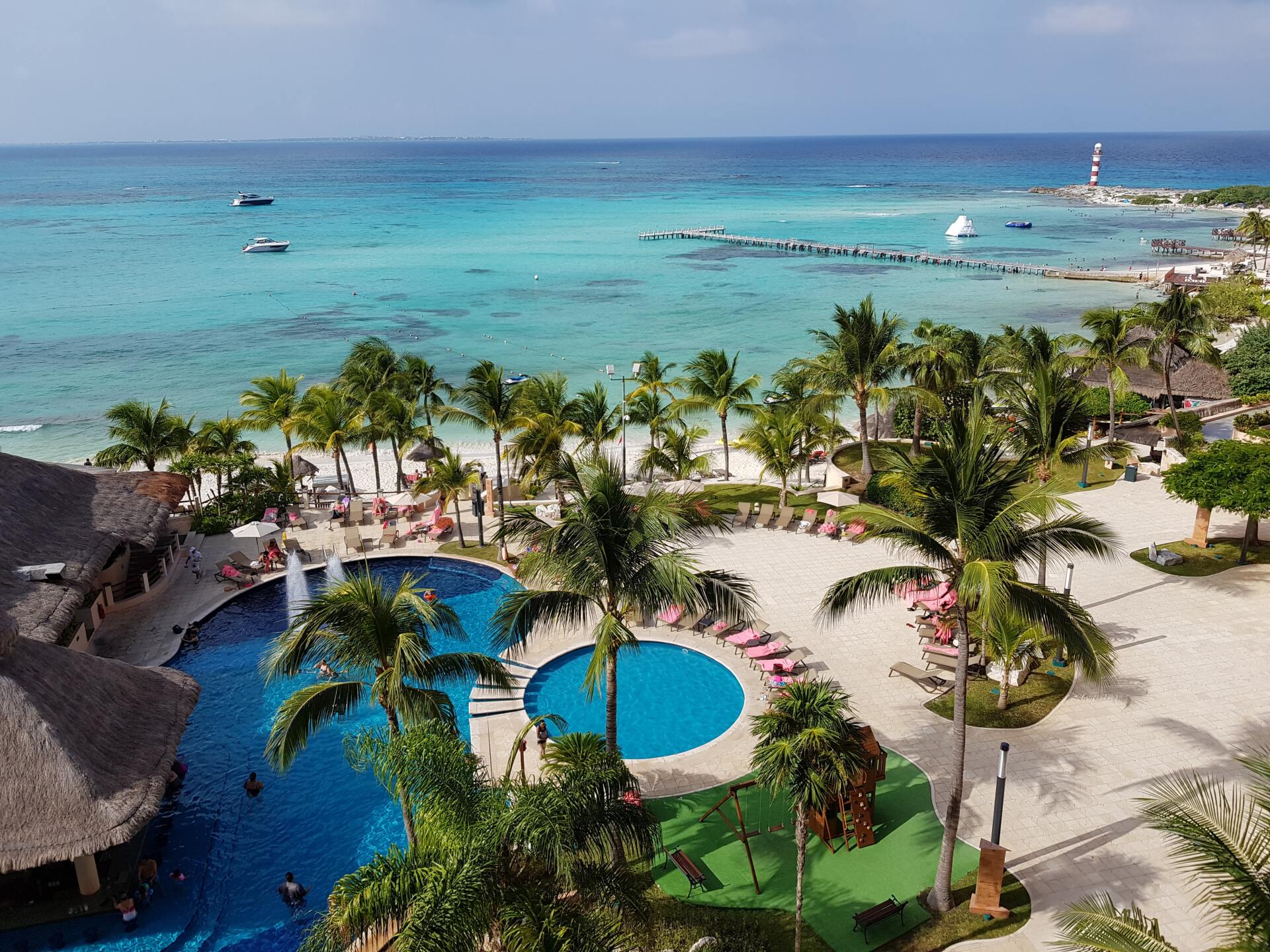 Land and Sea Travel all inclusive property beach and land Cancun Mexico