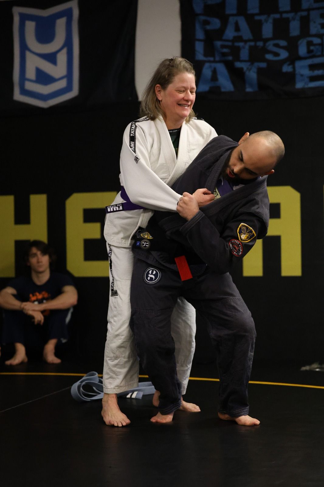 Adults drilling Jiu-Jitsu escapes at Hammer Sports and Performance in Hazlet, NJ for practical self-defense.