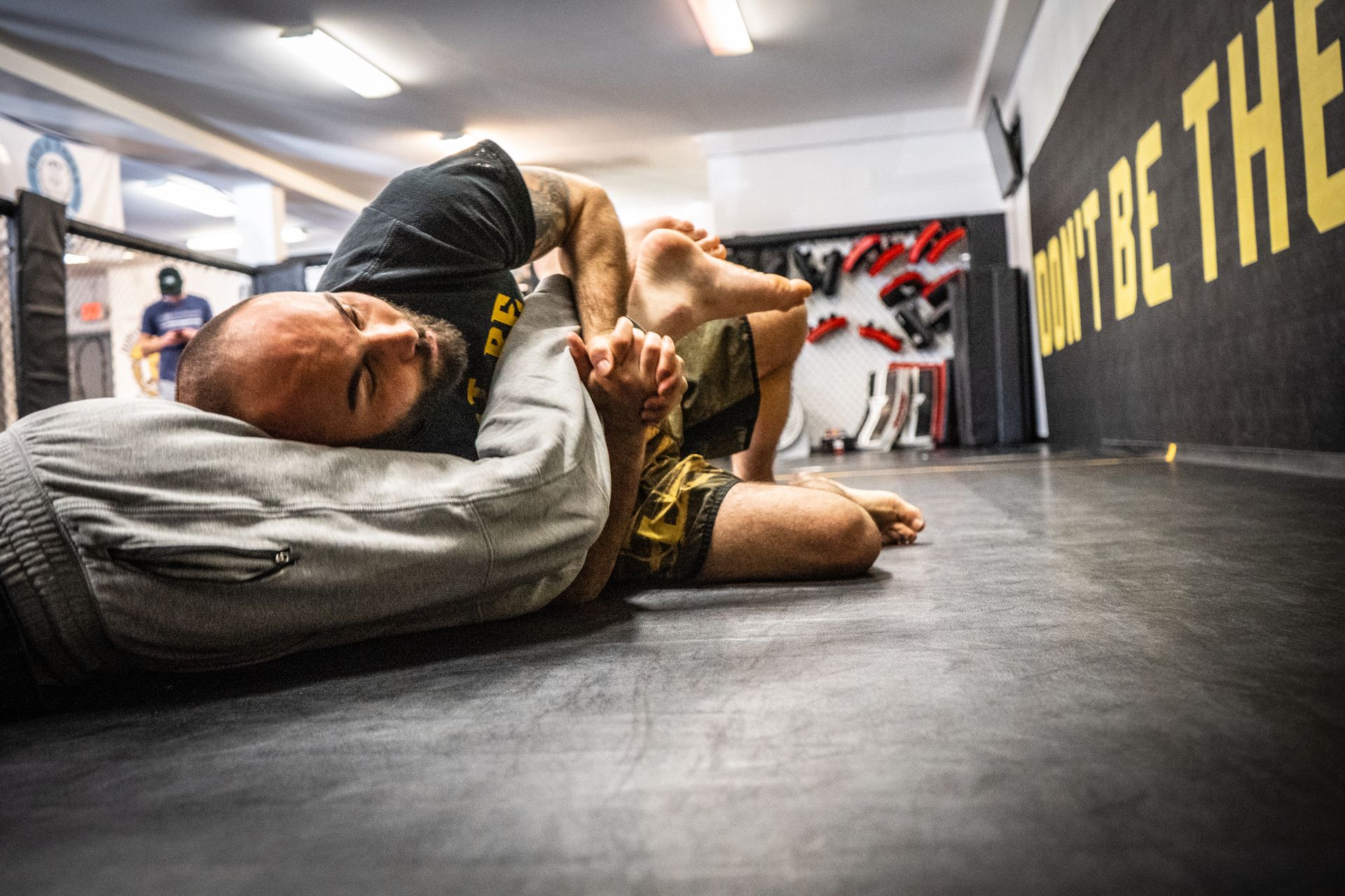 Adult students sparring in gi at Hamptons Jiu-Jitsu in Southampton, NY, building focus and resilience.