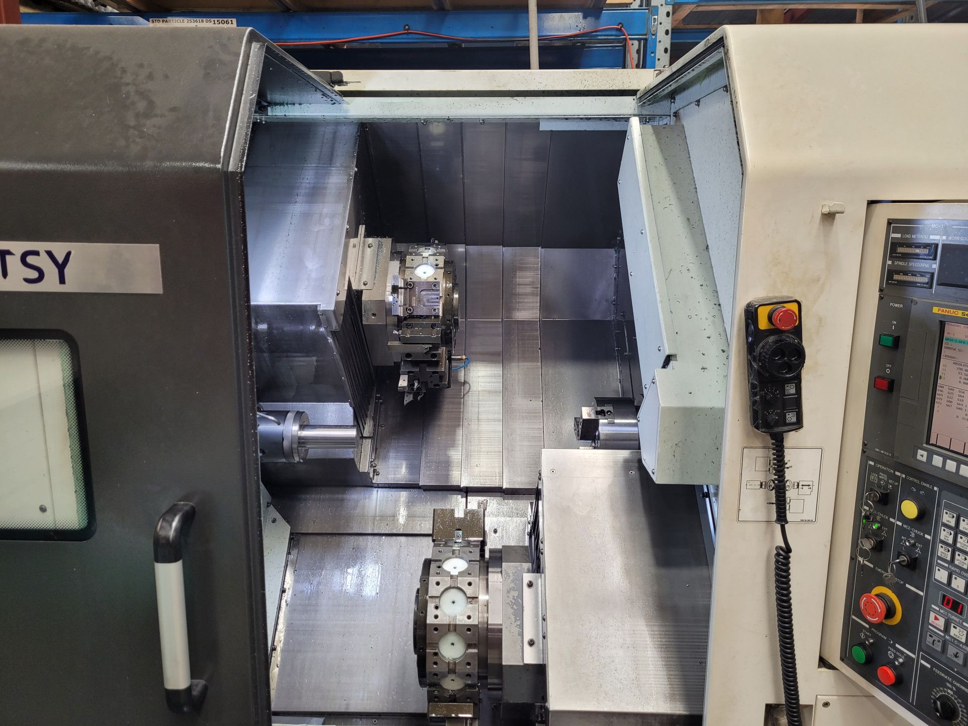 Interior View of An Industrial Cnc Lathe Machine with Its Work Area and Tool Turret — Real Engineering in West Gosford, NSW