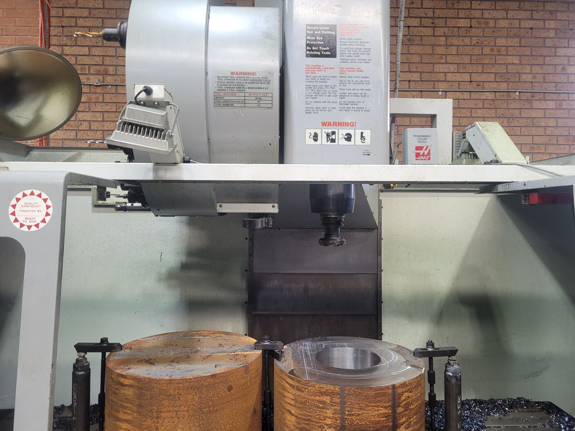 A Cnc Milling Machine with Two Large Cylindrical Metal Workpieces — Real Engineering in West Gosford, NSW