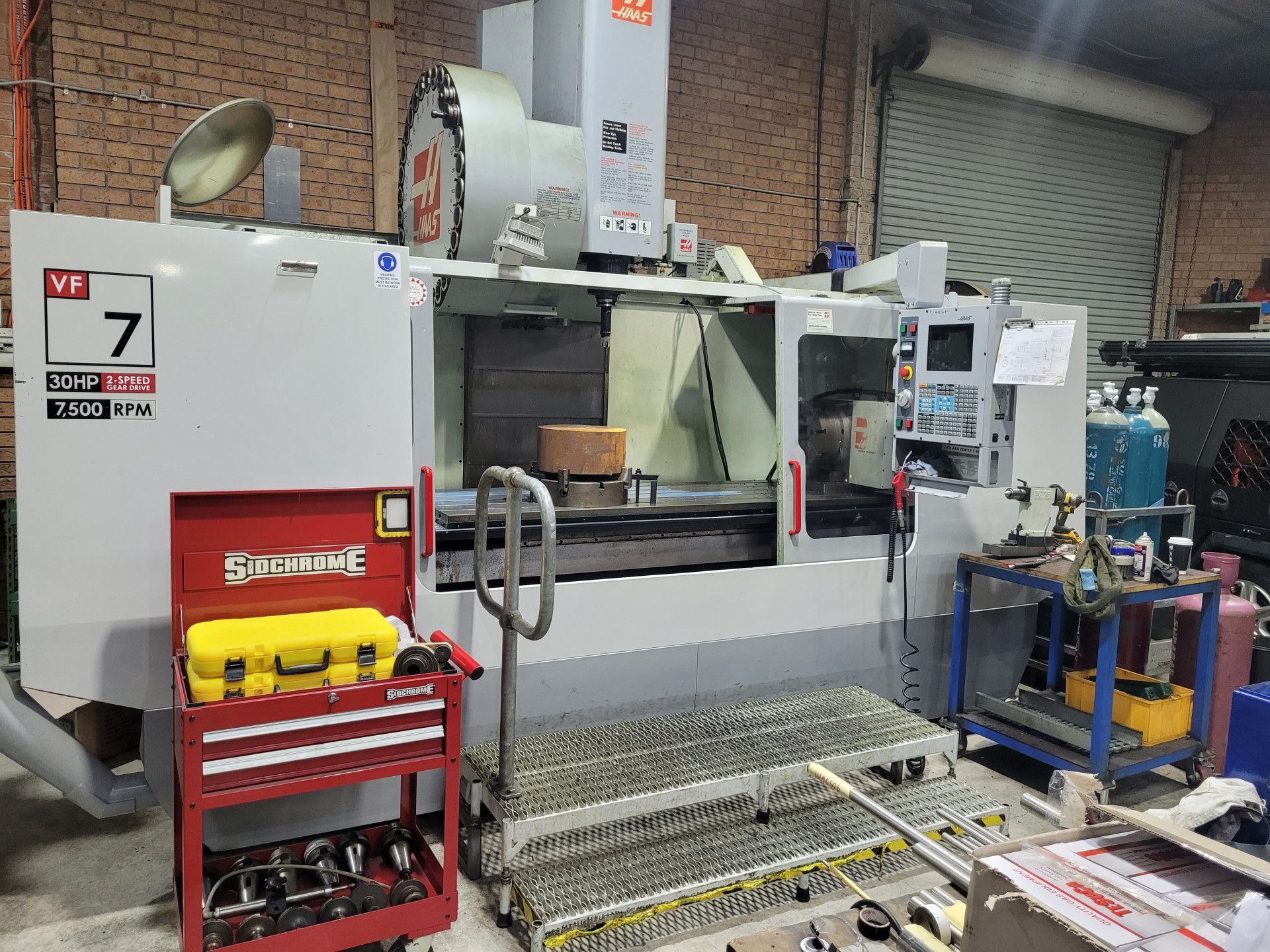 A Large Industrial Cnc Milling Machine Sits in A Workshop — Real Engineering in West Gosford, NSW
